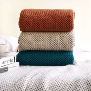 Couverture unie grosses mailles